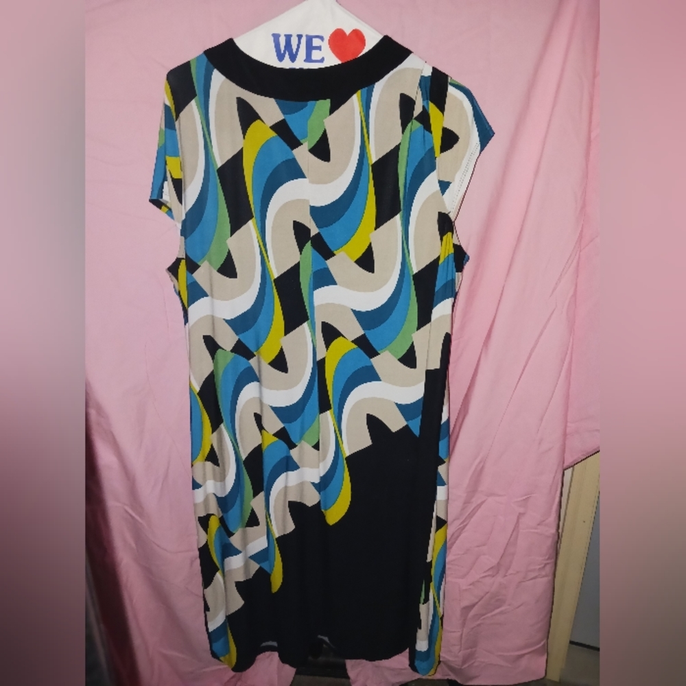 Sleeveless casual dress 40inchs long - 16 across shoulders, stretchy material.